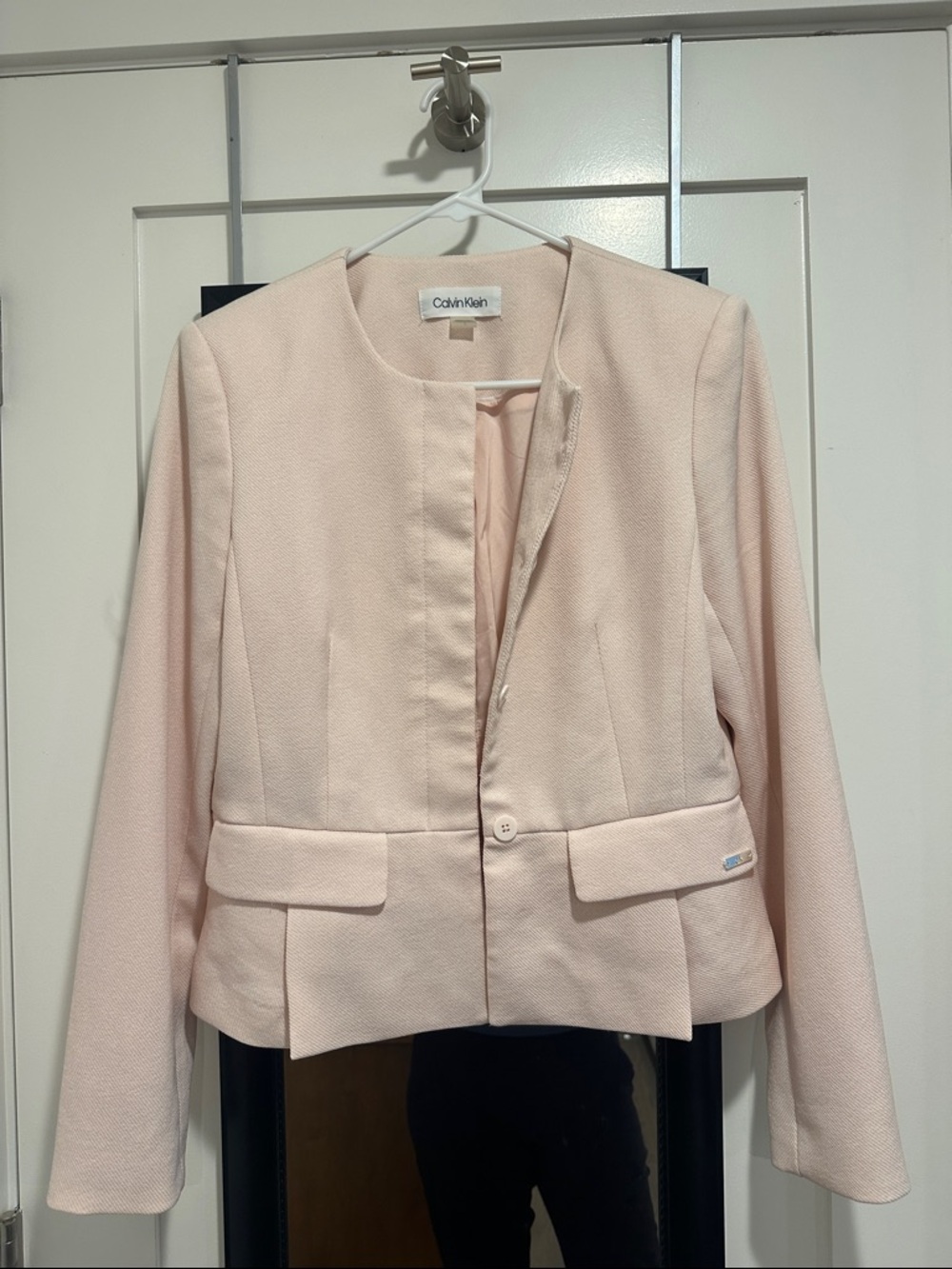 Light pink Calvin Klein peplum blazer